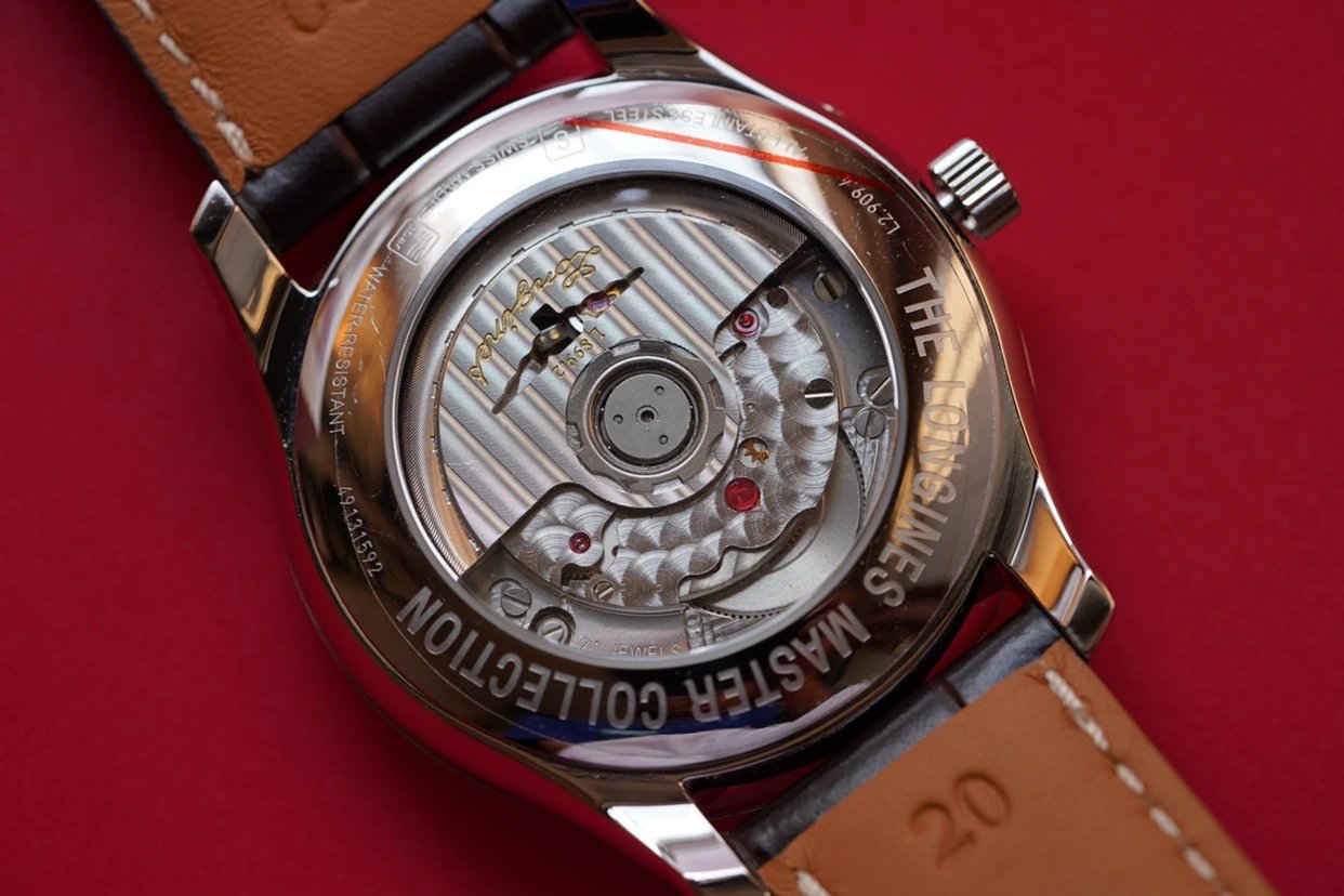 匠心之作 最高版本浪情名匠繫列L2.909.4.78.3月相皮帶男士機械手錶￥3900元-高仿浪琴